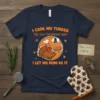 T-shirt with text "I Cook My Turkey The Old Fashioned Way I Let My Mom Do It" featuring a cartoon