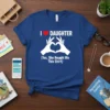 I ❤️ DAUGHTER (Yes, She Bought Me This Shirt) text design with heart and hand gesture graphic on a blue