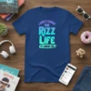 I didn't choose the rizz life it chose me text design in gradient colors on a blue t-shirt