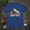 I Didn't Do It humorous cat t-shirt design with a calico cat knocking over a plant pot and spilling dirt