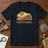 T-shirt with "I Dig Fossils" text and a graphic of fossil layers with ammonite and trilobite