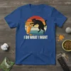 Retro sunset graphic tee with text "I Do What I Want" and a black cat knocking over an orange drink