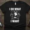 Black t-shirt with white text "I DO WHAT I WANT" above a cartoon cat wearing sunglasses sitting in a chair