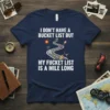 I DON'T HAVE A BUCKET LIST BUT MY FUCKET LIST IS A MILE LONG text on a navy blue t-shirt