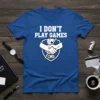 I DON'T PLAY GAMES text on a blue t-shirt with a shield graphic featuring a handshake, playing cards, and a
