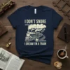 I DON'T SNORE I DREAM I'M A TRAIN text with a cartoon steam train graphic on a navy t-shirt