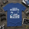 Blue t-shirt with "I DRIVE ROBOTS" text and a cartoon Mars rover design with a gamepad controller