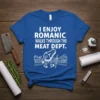 I Enjoy Romanic Walks Through The Meat Dept. quote on a blue t-shirt with a cartoon steak walking through a