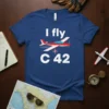 I fly C 42 text with a red and white airplane graphic and compass rose on a blue t-shirt