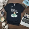 I Go To School Pajamas text with a cute sloth in pajamas reading on a book, on a navy t-shirt