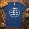 I Got It From My Momma text with a crown and flexed arm graphics on a blue t-shirt