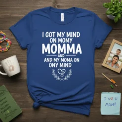 T-shirt with white text "I Got My Mind On Momma And My Mama On Ony Mind" in a playful font