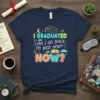 I GRADUATED CAN I GO BACK TO BED NOW? NOW? text on a navy t-shirt with graduation cap and sleeping