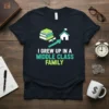 T-shirt with text "I GREW UP IN A MIDDLE CLASS FAMILY" and graphics of books, diploma, arrow, and house