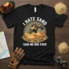 Black t-shirt featuring "I Hate Sand Glamis Sand Dunes Said No One Ever" quote with a dune buggy jumping sand