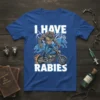 I Have Rabies T-Shirt with a werewolf riding a motorcycle and wolves in the background