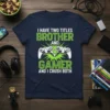T-shirt with green text "I Have Two Titles Brother And Gamer And I Crush Both" and graphic of two video