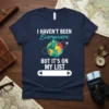T-shirt with the text "I HAVEN'T BEEN Everyvvere BUT IT'S ON MY LIST" and a globe graphic, for travel lovers