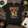 T-shirt with "BRUCE I HEARD BRUCE MIGHT SHOW UP" text and silhouette of a guitarist performing under spotlights