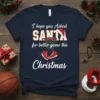Navy t-shirt with white text "I hope you Asked SANTA for better game this Christmas" featuring basketball hoop and red