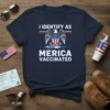I Identify As Merica Vaccinated t-shirt with eagle graphic and American flag elements, navy blue shirt