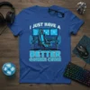I Just Have A Better Gaming Chair quote on a blue t-shirt, featuring a gaming desk with multiple monitors and