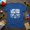 I Just Hope Both Teams Have Fun quote on a blue t-shirt with graphics of swirling teams and sports balls
