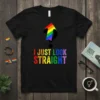 Black t-shirt with "I JUST LOOK STRAIGHT" text in rainbow colors and a rainbow arrow pointing upwards from a question