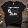 I Just Love Cats I Don't Know Why t-shirt with a leaping cat, moon, and stars graphic
