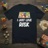 Navy blue t-shirt featuring the text "I JUST LOVE RISK" in white, above a colorful Risk board game map graphic
