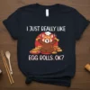 I Just Really Like Egg Rolls OK text with red panda chef design on a navy t-shirt
