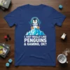 I Just Really Like Penguins & Gaming, OK? text on a t-shirt featuring a cartoon penguin wearing headphones and holding