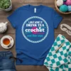 I JUST WANT TO DRINK TEA crochet OZZZ and Take naps text design on a blue t-shirt with crochet elements