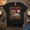 I JUST WANT TO EAT PIZZA AND WATCH SLASHER MOVIES text design on black t-shirt with pizza and VHS graphic