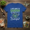 I Just Want To Garden And Hangout With My Butterflies quote on a royal blue t-shirt with a floral wreath