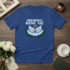 T-shirt with the text "I Know Heaven Is A Beautiful Place" featuring angel wings, clouds, and a laurel wreath