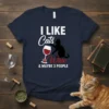 I LIKE Cats Wine & MAYBE 3 PEOPLE text with black cat silhouette and wine glass graphic on navy t-shirt