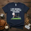 I LOVE BASEBALL.. ESPECIALLY WHEN THEY TOUCHDOWN text on a navy t-shirt with a graphic of a baseball player running