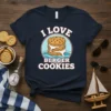 Navy t-shirt with "I LOVE BERGER COOKIES" text and a graphic of a sandwich cookie with frosting
