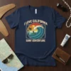 I LOVE CALIFORNIA SURF ADVENTURE retro t-shirt design with a surfer on a wave and palm trees