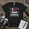 Black t-shirt with "I Love EMO GIRLS" text, broken heart graphic, roses, and skulls in a thorny frame