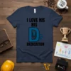 Navy t-shirt with black text "I Love His Dedication" and a blue graphic of a large D with an upward