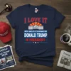 Navy t-shirt with bold red and blue text: "I LOVE IT WHEN I WAKE UP IN THE MORNING AND DONALD