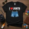I Love Jorts t-shirt design featuring a red heart and distressed denim shorts hanging on a clothesline