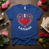 Blue t-shirt with white text "I Love Latinas" inside a floral heart design, celebrating Latina pride