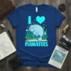 I Love Manatees T-Shirt with a cute illustration of a manatee surrounded by seaweed and bubbles