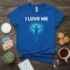 Blue t-shirt with white text "I LOVE ME" above a silhouette of a person with arms outstretched inside a heart