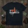I Love Morocco t-shirt design with a red heart containing a green Moroccan star and an illustration of the Koutoubia