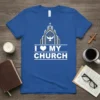 I Love My Church T-Shirt with church graphic, dove, and heart symbol. Blue tee with white text