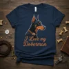 I Love my Doberman text with a geometric Doberman dog illustration on a navy t-shirt